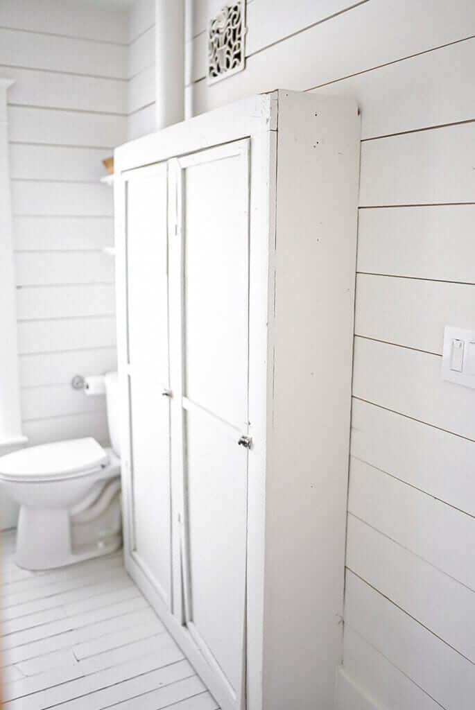 Bathroom storage cabinet made out of an old cabinet