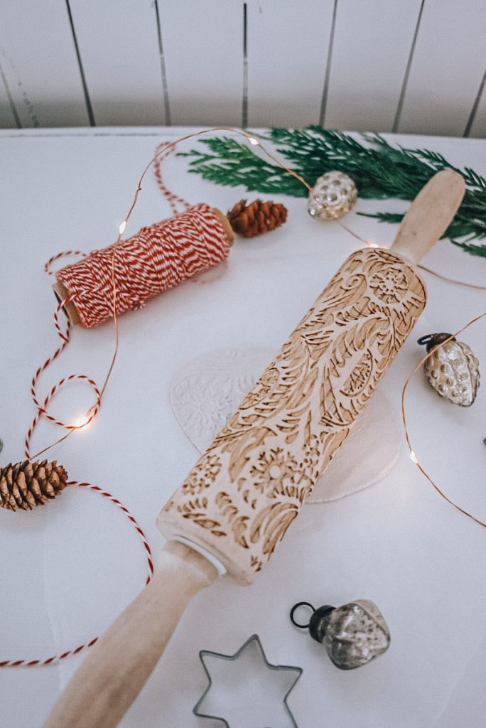 embossing clay with a paisley rolling pin