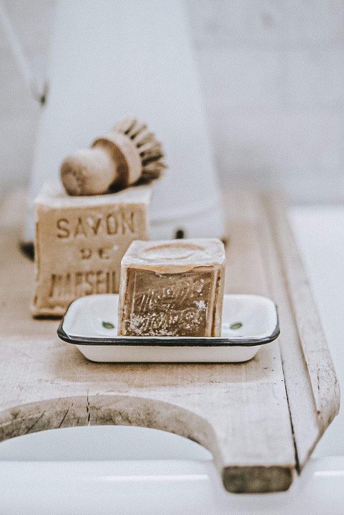 simple french soaps on wooden wash board