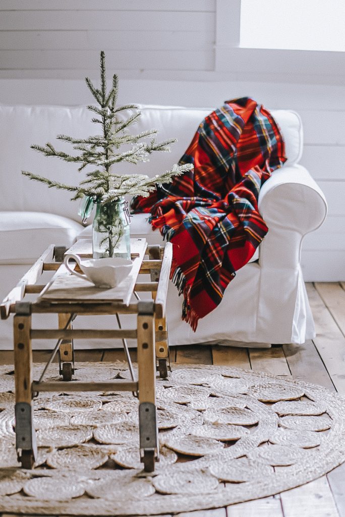 tartan blanket on a sofa