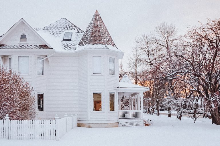 victorian house painted in oxford white by benjamin moore on the exterior