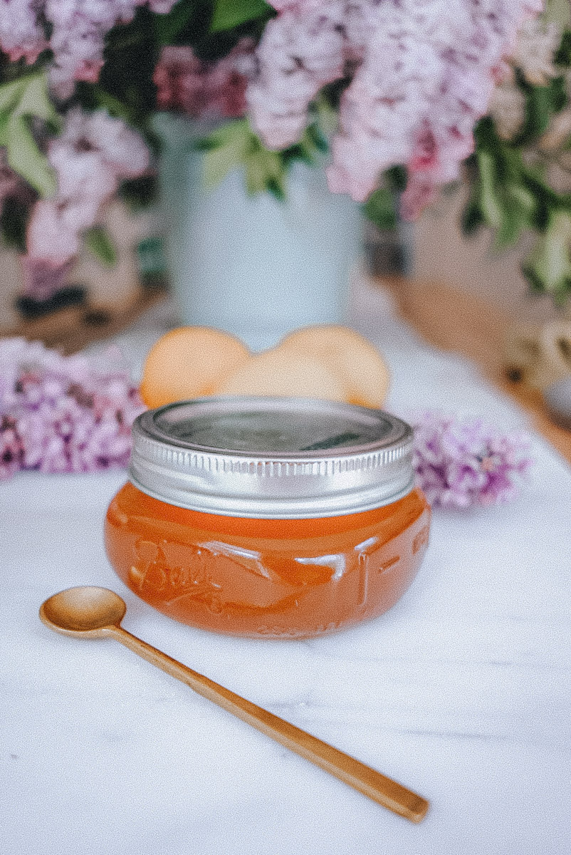 lilac simple syrup in a mason jar