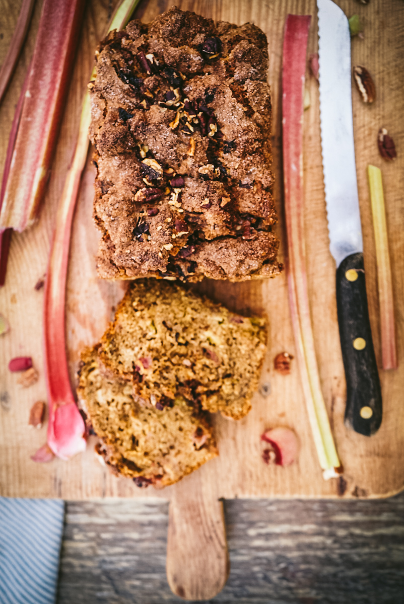 Sliced Rhubarb bread on a cutting board.