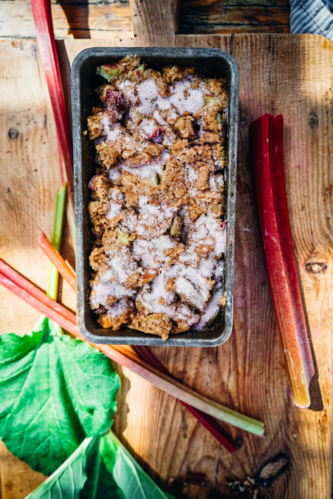 Baked rhubarb bread in a pan.