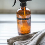 All purpose cleaning spray in a amber glass bottle.