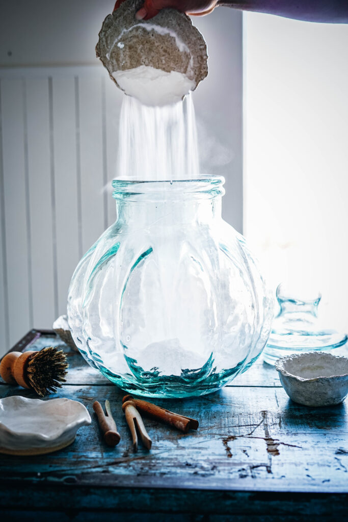 Mixing ingredients to make homemade laundry detergent